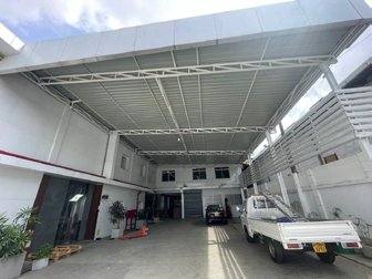 Steel roofing canopy fabrication at factory site